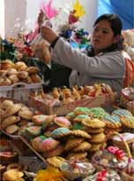 Vendedora em mercado de doces de San Cristbal